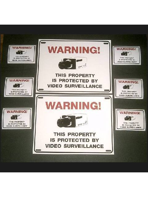 Security camera alarm system burglar warning sign lot