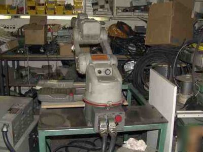 Motoman - SV3 6-axis articilated robot w/ part machine