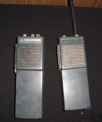 2 motorola handi-talkie radios