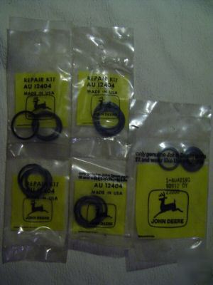 5-j deere valve repair kits:(4) AU12404 & (1) AU42191 