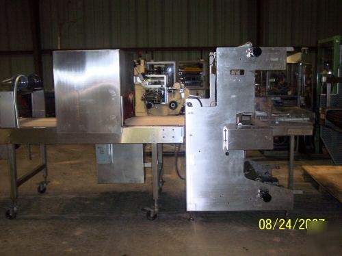 Omega dl-27 overwrap machine/bundler and heat tunnel