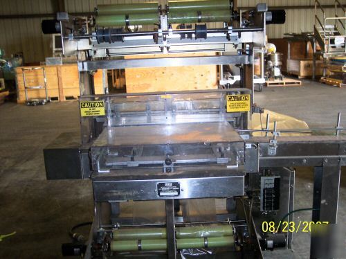 Omega dl-27 overwrap machine/bundler and heat tunnel