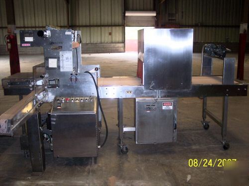 Omega dl-27 overwrap machine/bundler and heat tunnel