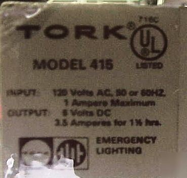 Tork model #415, emergency lighting, beige & wood tone