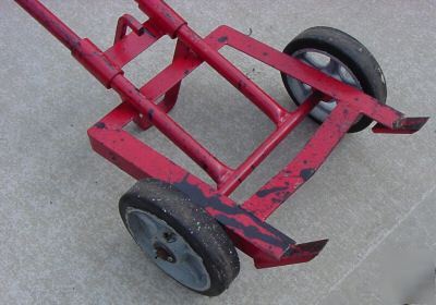 Heavy duty barrel or drum hand truck and use stand used