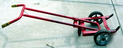 Heavy duty barrel or drum hand truck and use stand used