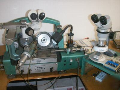 Machine for resharpening microdrills for circuit board