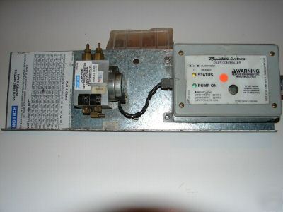 Rapistan oiler pump and controller automatic timed