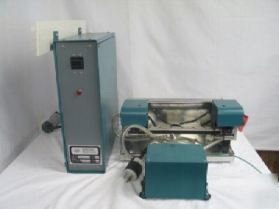 Solid state equipment 1050 package lid tacking station